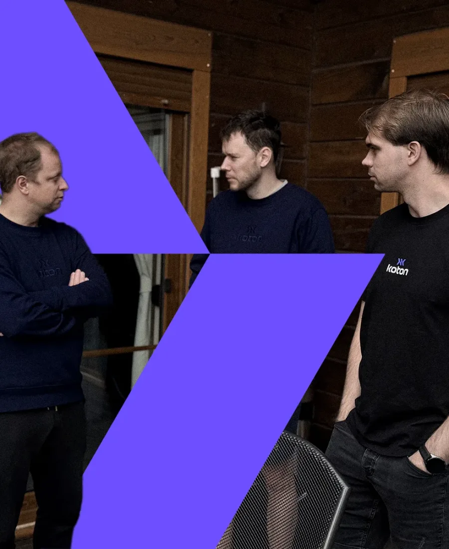Three members of the Koton team talking on a terrace